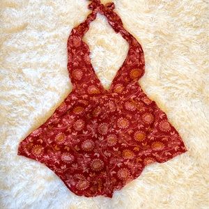 Red open back halter romper